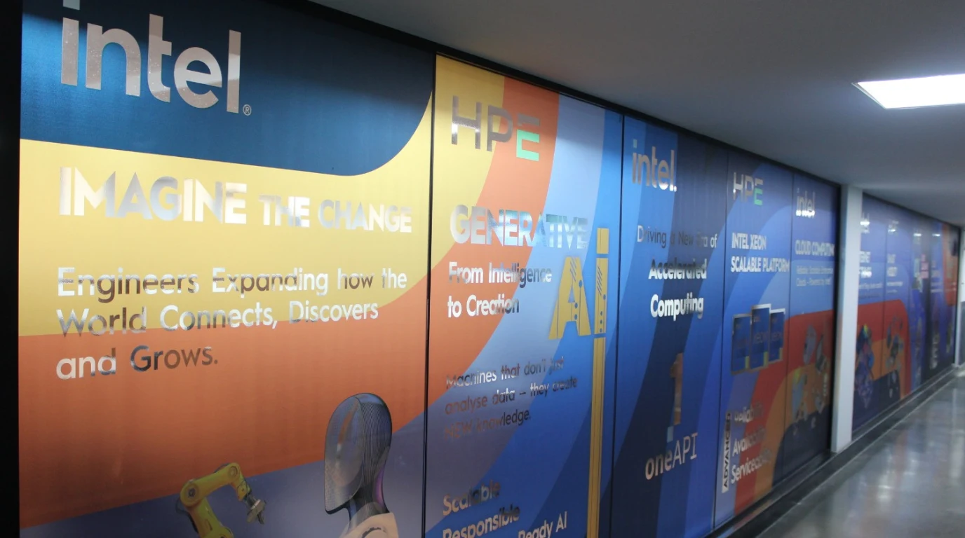 Intel and HPE Generative AI wall graphics and research panels in NCU computing corridor
